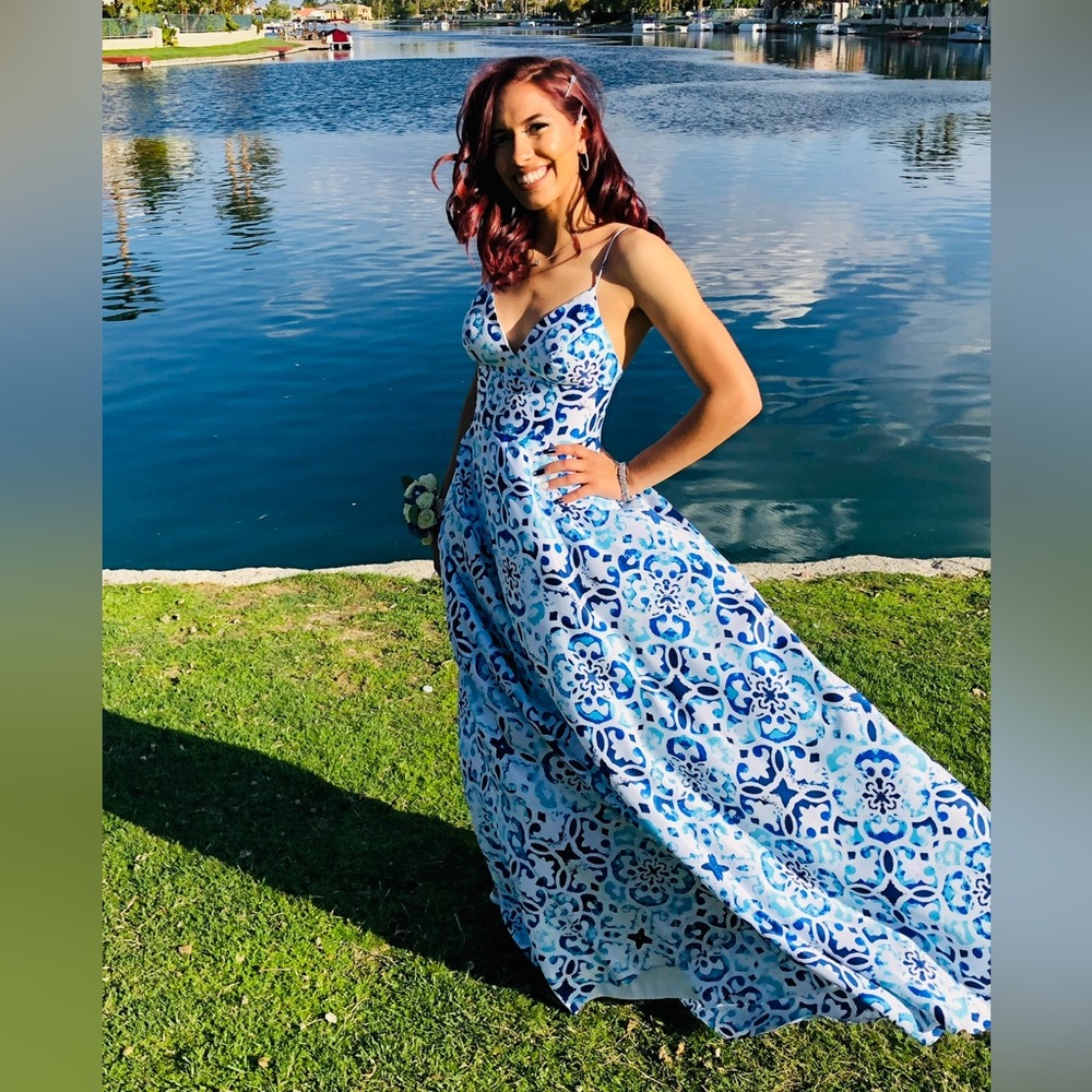 Betsy & Adam dress bought at David's Bridal. Size 2. Worn once.